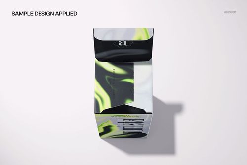 Top view of an open carton box with a black, white, and neon green abstract pattern, shown as a PSD mockup.