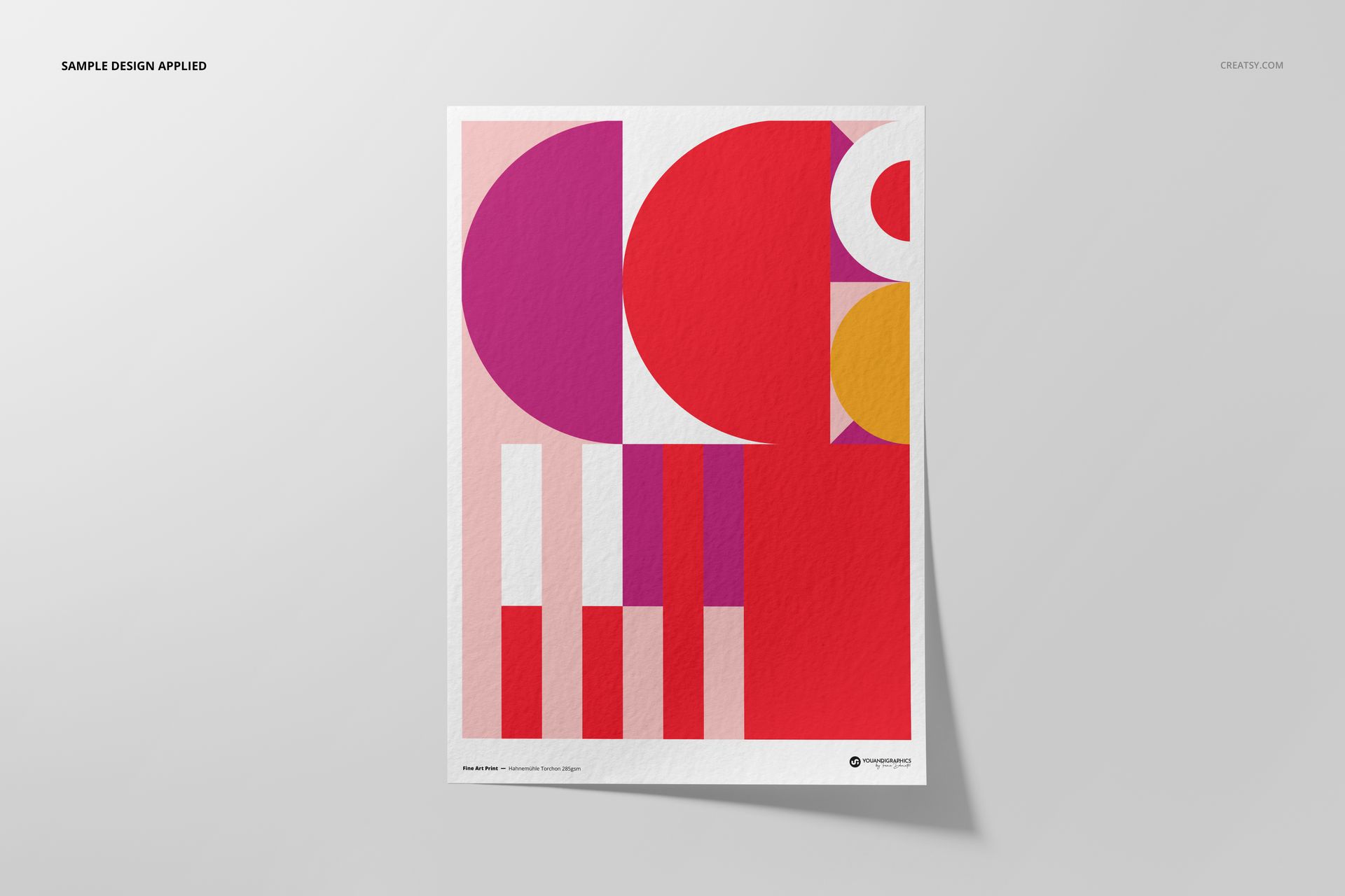 A3 fine art print mockup featuring geometric abstract shapes in pink, red, orange, and white on textured paper.