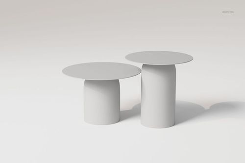 Two minimalist disc coffee tables with round tops and cylindrical bases, shown in a neutral white setting, front view.