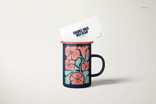 Front view of a 450ml enamel mug mockup featuring pink and green flowers, with a card placed inside the mug.