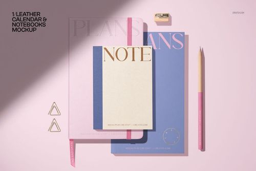 Flat lay of a stationery mockup set with pastel-colored notebooks, note pad, pencil, sharpener, and paper clips.