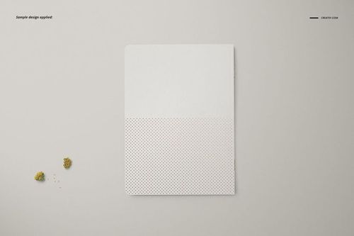 Top view of an A5 classic notebook mockup with a minimalist white cover and subtle dotted pattern at the bottom.