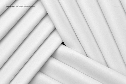 Close-up of white fabric folds intersecting in a diagonal pattern, presented as a fabric PSD mockup for design use.