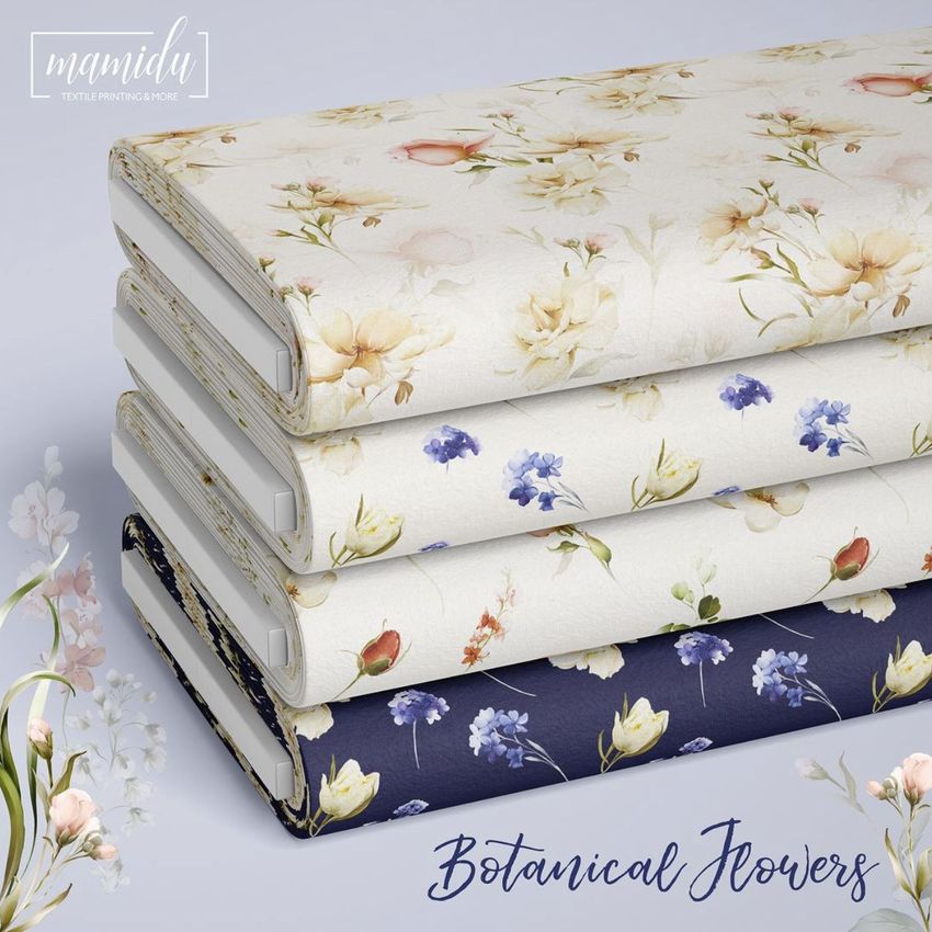 Fabric bolts mockup featuring four stacked bolts with floral patterns in soft beige, cream, and navy blue tones.