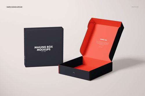 Mailing box mockup set featuring a closed black box and an open box with a red interior on a light background.