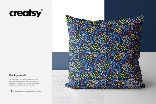 Throw pillow mockup displaying a lively botanical print in multiple colors, set in front of a white and navy background.