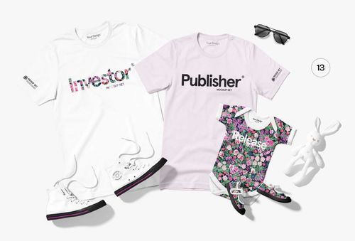 PSD mockup showing two adult t-shirts and a floral baby onesie arranged flat with sneakers, sunglasses, and a plush bunny.