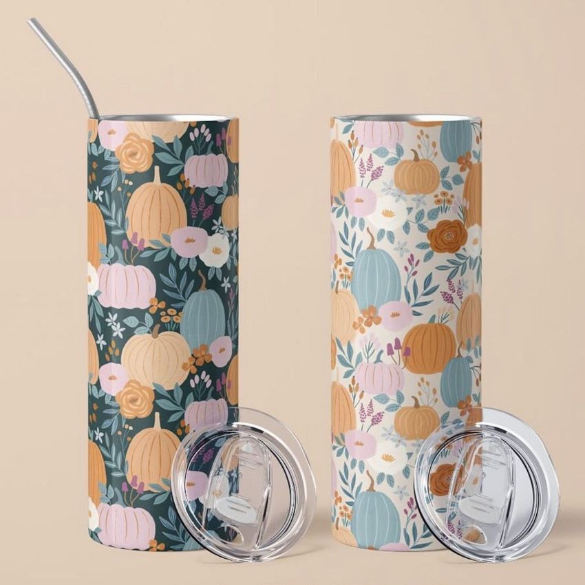 Skinny tumbler mockup featuring two 20oz drinkware items with floral and pumpkin patterns, shown with clear lids on a beige background.