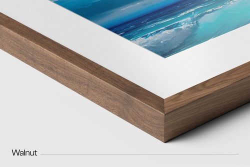 Closeup view of a solid wooden frame mockup with walnut finish, featuring a blue ocean print and white matting.