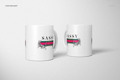 Two white 11oz mugs with a horizontal striped design and lion illustration, shown side by side on a plain background.