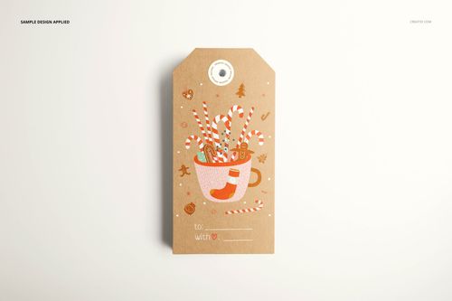 Front view of a kraft paper label mockup, decorated with a cup filled with candy canes and Christmas-themed graphics.
