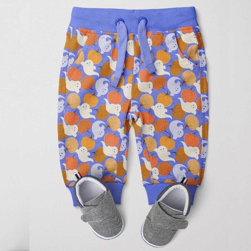 Baby sweatpants mockup featuring a playful Halloween-themed pattern with pumpkins and ghosts, styled with gray baby shoes on a plain background.