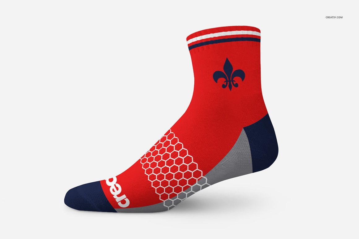 Athletic sock mockup featuring a side view of a red sock with navy and white accents, honeycomb pattern, and fleur-de-lis motif.
