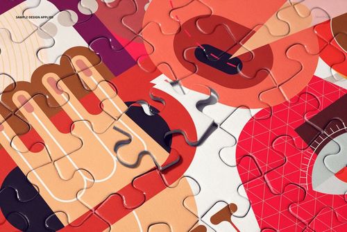 Close-up of a heart jigsaw puzzle mockup with vibrant geometric patterns and interlocking pieces visible.