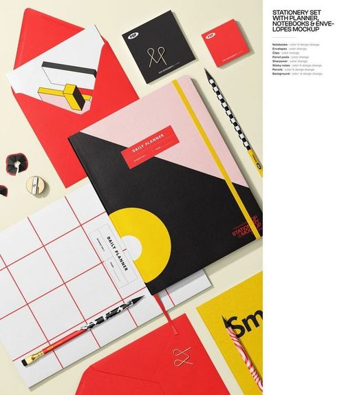 Assorted stationery mockup with notebooks, planner, envelopes, and various school accessories in red, yellow, and black.