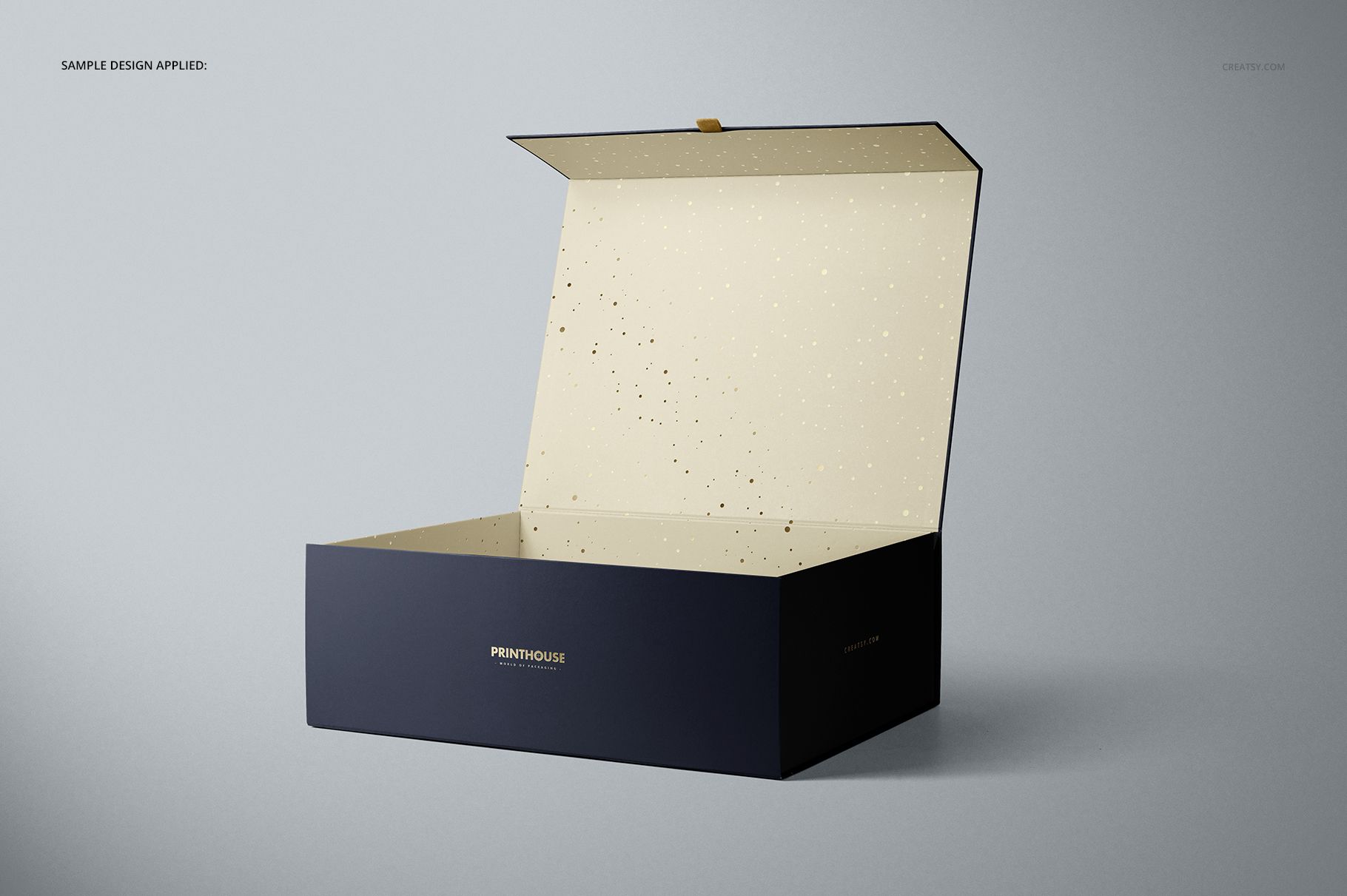 Open magnetic gift box mockup in front view, featuring a dark blue outside and light speckled inside on a gray background.