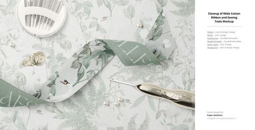 Botanical print fabric mockup with green ribbon, crochet hook, sewing tools, and pearls arranged on a white background.