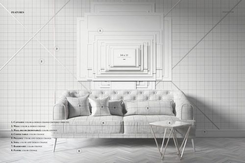 Front view of a light gray art deco sofa with patterned cushions, set against a wall displaying layered blank canvas mockups in various sizes.