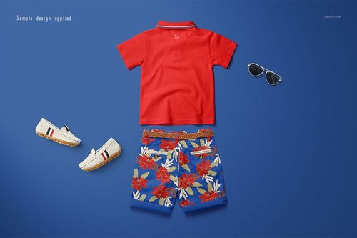 Kids polo set mockup featuring a red short-sleeve shirt and blue floral shorts, displayed flat on a blue background.