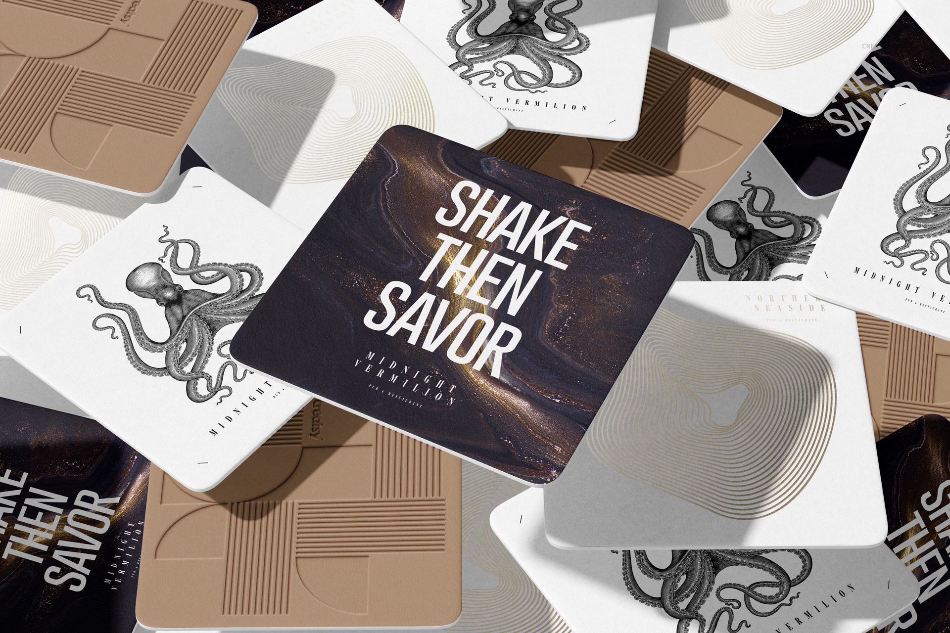 Top view of multiple square coasters with different patterns, including line art, octopus illustration, and mockup text.
