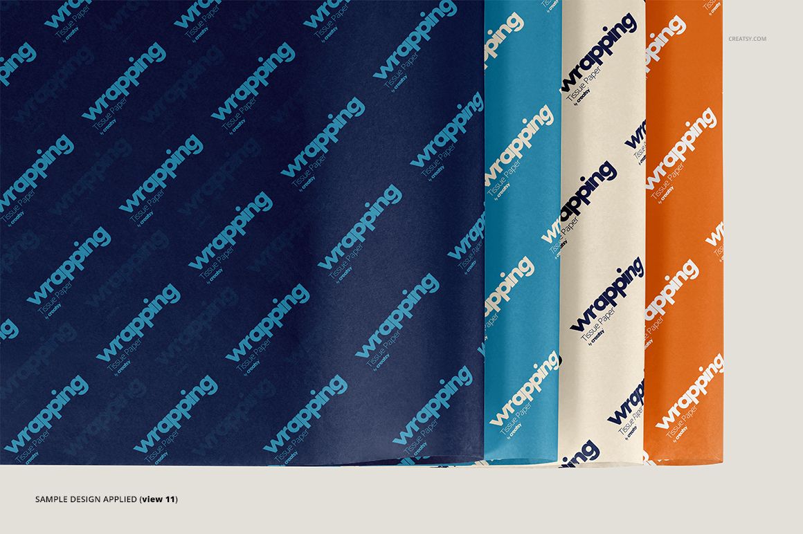 Four sheets of wrapping tissue paper mockup displayed side by side in navy blue, teal, cream, and orange colors.