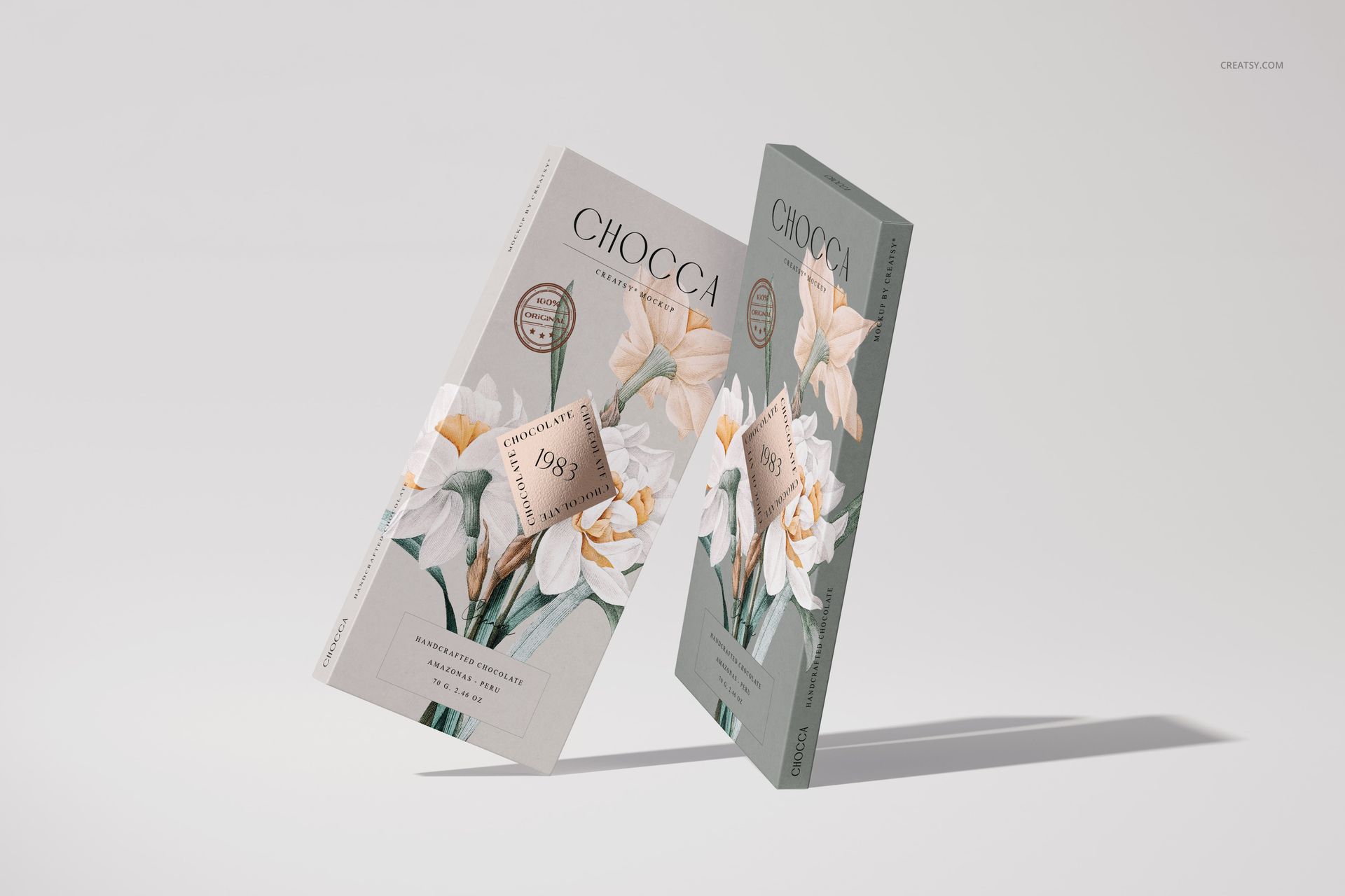 Two chocolate bar packaging mockups with floral designs, one in beige and one in green, floating on a light background.