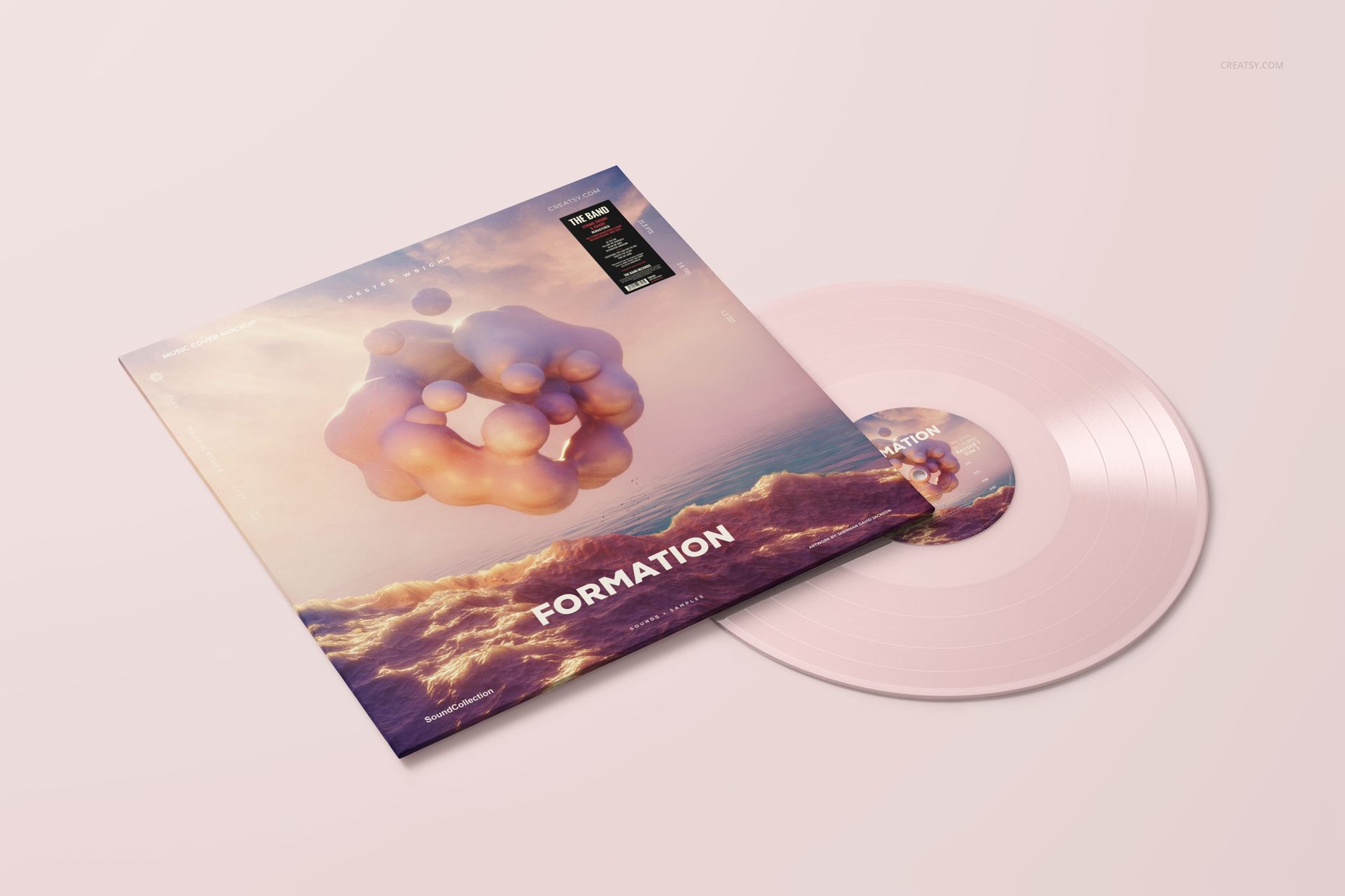 Colored vinyl record mockup with a pale pink disc and illustrated sleeve, shown on a light background from an angled perspective.
