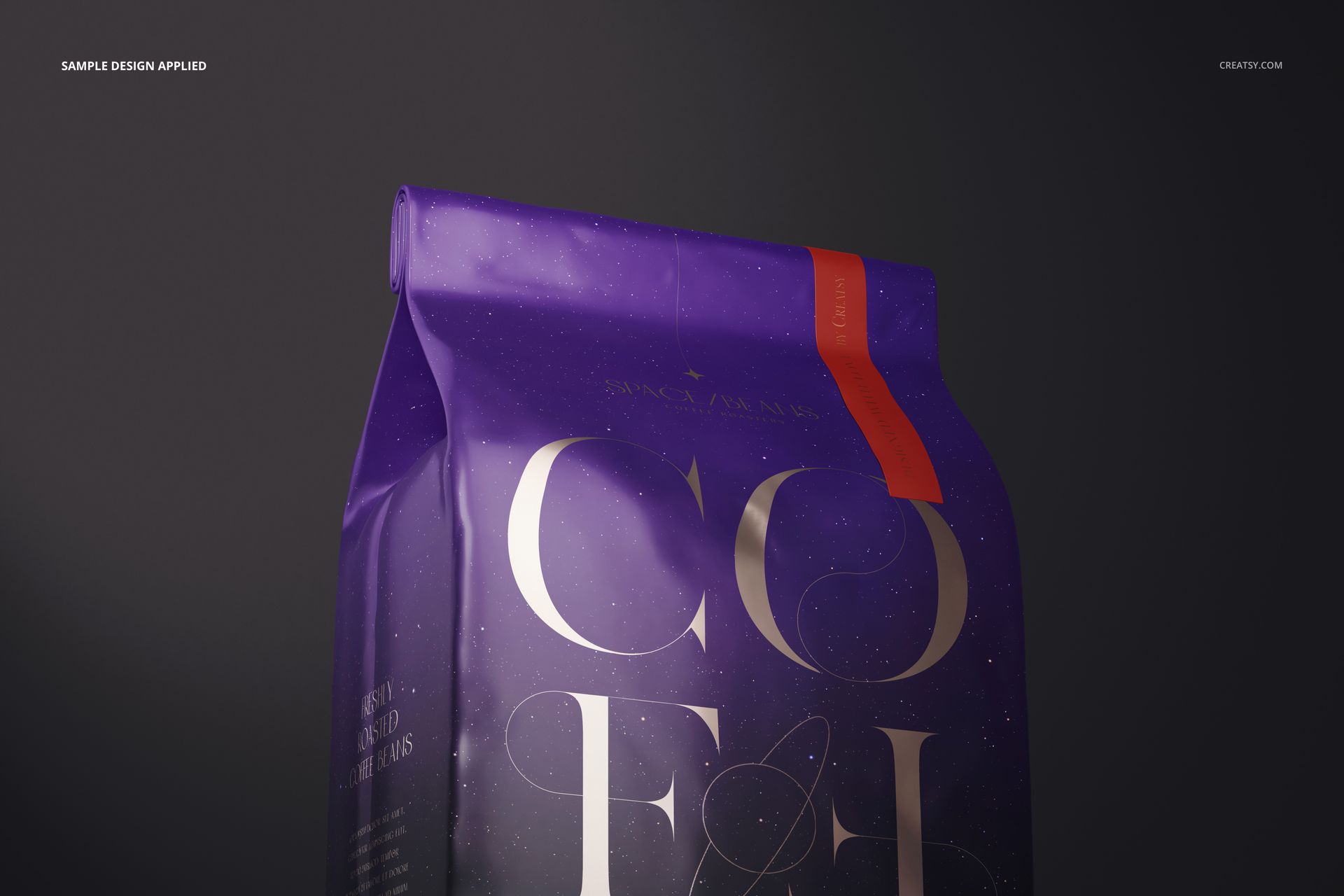 Glossy coffee bag mockup shown from a front angle, featuring a purple surface with large white letters and a red accent.