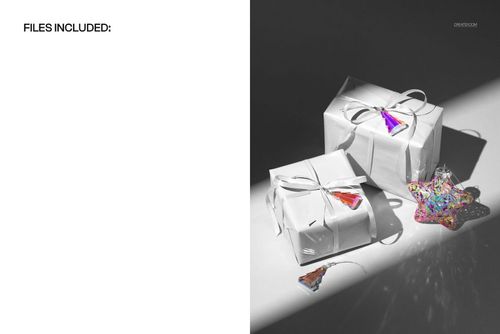 Christmas gift boxes wrapped in white paper and ribbon, shown with star and tree ornaments in a PSD mockup scene.