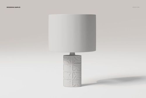 Front view of a decorative table lamp with a cylindrical textured base and a plain white drum-shaped lampshade.