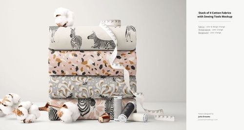 Front view of cotton fabric mockup featuring four patterned bolts, measuring tape, thread spools, and cotton branches.