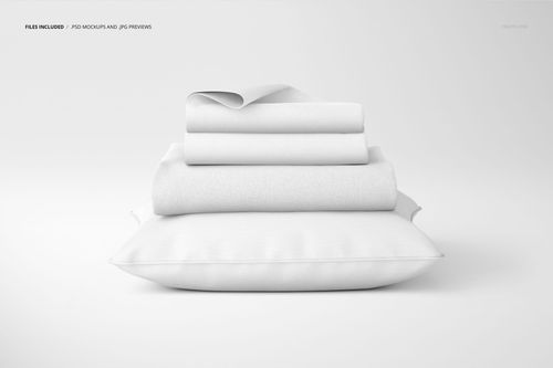 Front view of a stack of white pillowcases, a blanket, and a braid pillow arranged on a plain surface in a mockup scene.