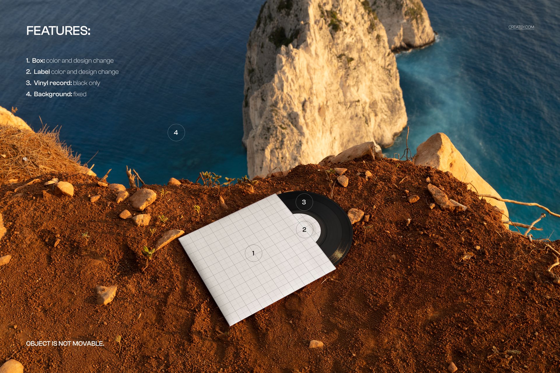 PSD mockup showing a 7 inch black vinyl record in a white grid-patterned sleeve, set on brown rocky terrain by the sea.
