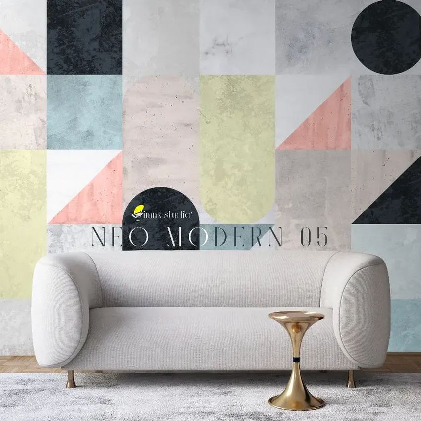 Sofa canvas print mockup showing a modern cream lounge sofa in front of a geometric pastel and black wall art design.