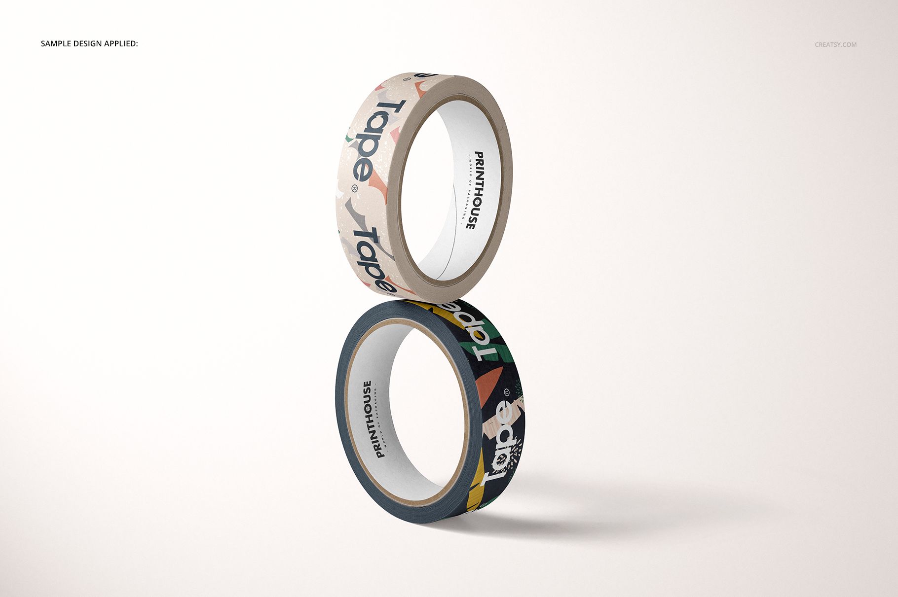 Stacked paper packing tape mockup featuring vibrant artwork, shown in a clean minimalistic setting, front perspective.