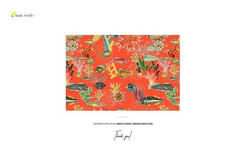 Underwater-themed cotton fabric mockup with colorful fish and coral motifs set against a bold orange backdrop, top view.