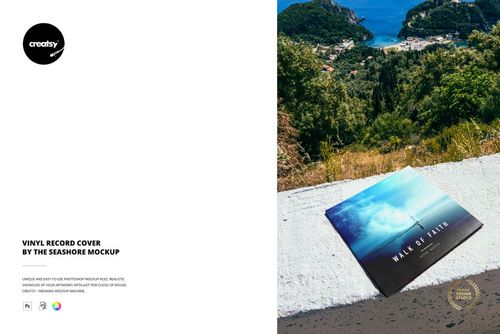 Vinyl record cover mockup placed on a concrete surface by the seashore, with blue water and green hills in the background.