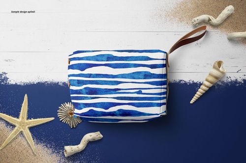 Little leather pouch wallet mockup displayed from above, featuring blue striped pattern and surrounded by seashells.