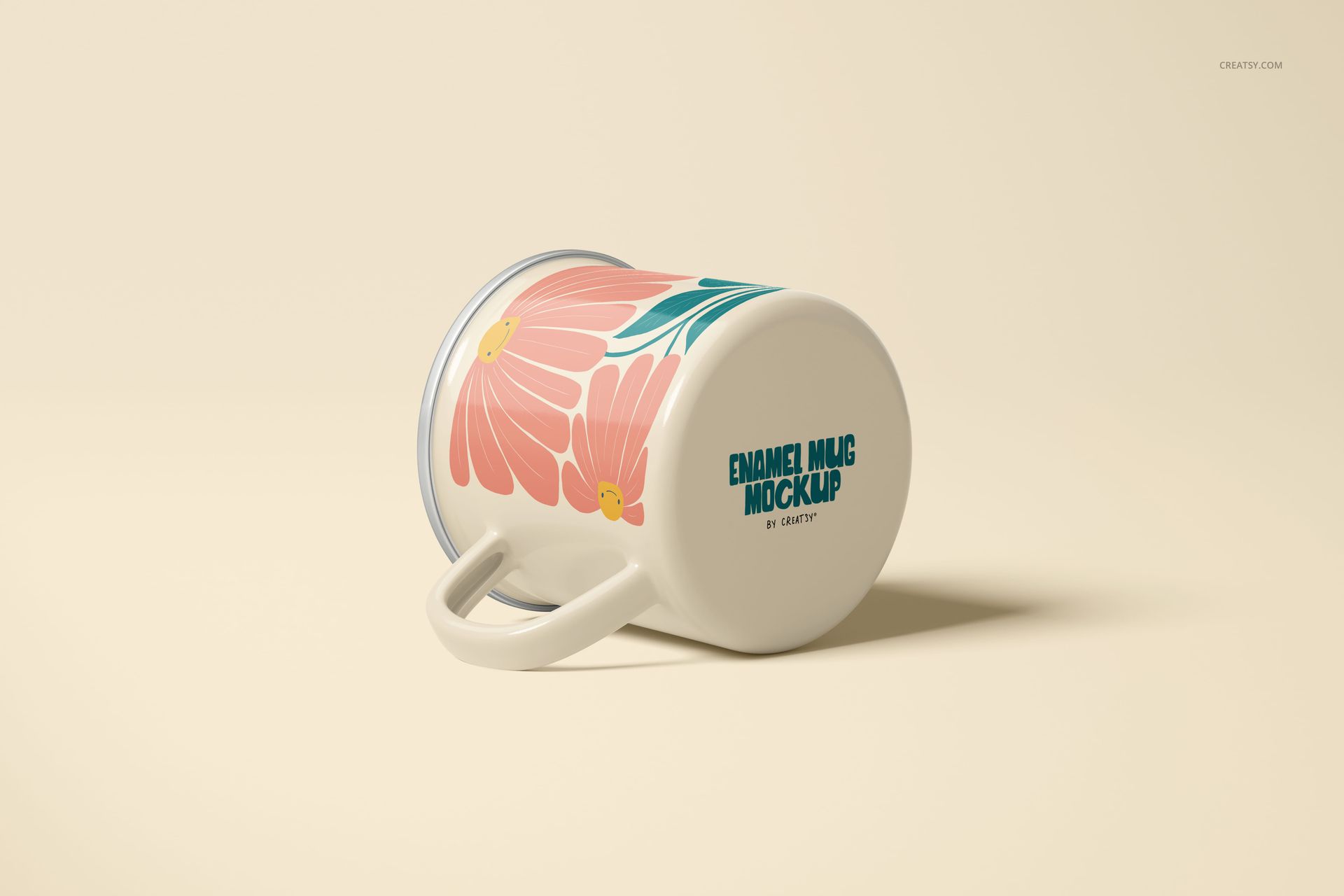 Front side view of a 360ml enamel mug mockup with silver rim, pink flower pattern, and blue lettering on cream surface.