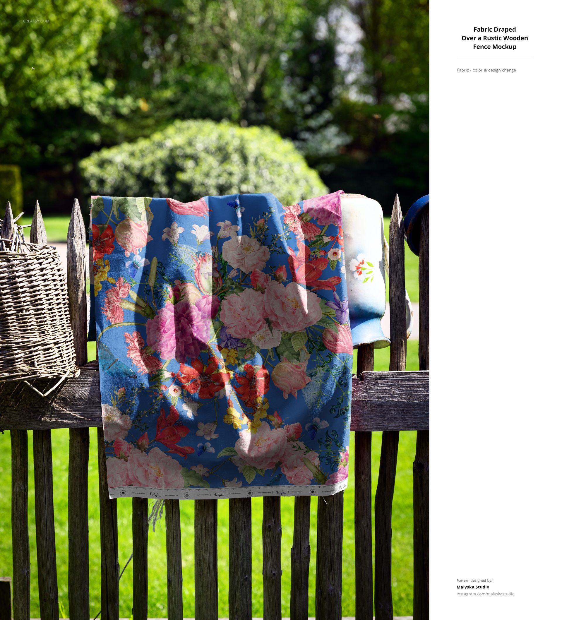 PSD mockup showing a flower-printed fabric hanging on a fence with plants and a wicker basket in the background.