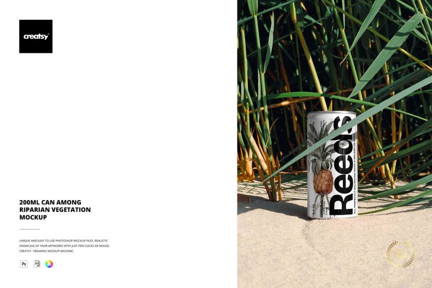 200ml can with botanical design standing upright on sandy ground among tall green riparian vegetation, front view.