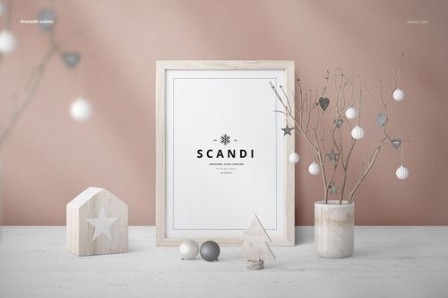 Scandi-style Christmas mockup featuring a blank frame, wooden decorations, baubles, and a vase with branches.