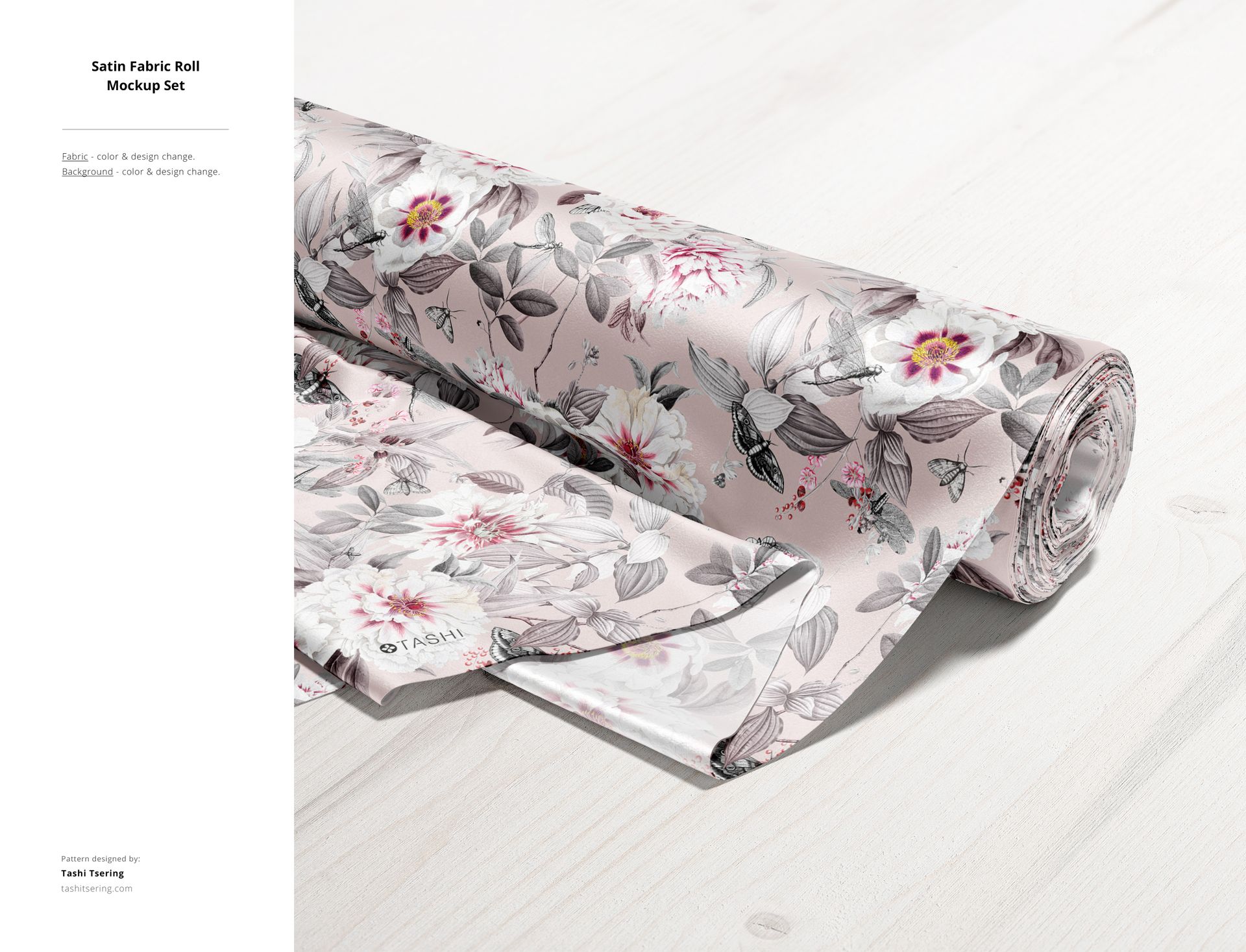 PSD mockup of a satin fabric roll featuring a detailed botanical print in muted pink and gray, shown from a side angle.