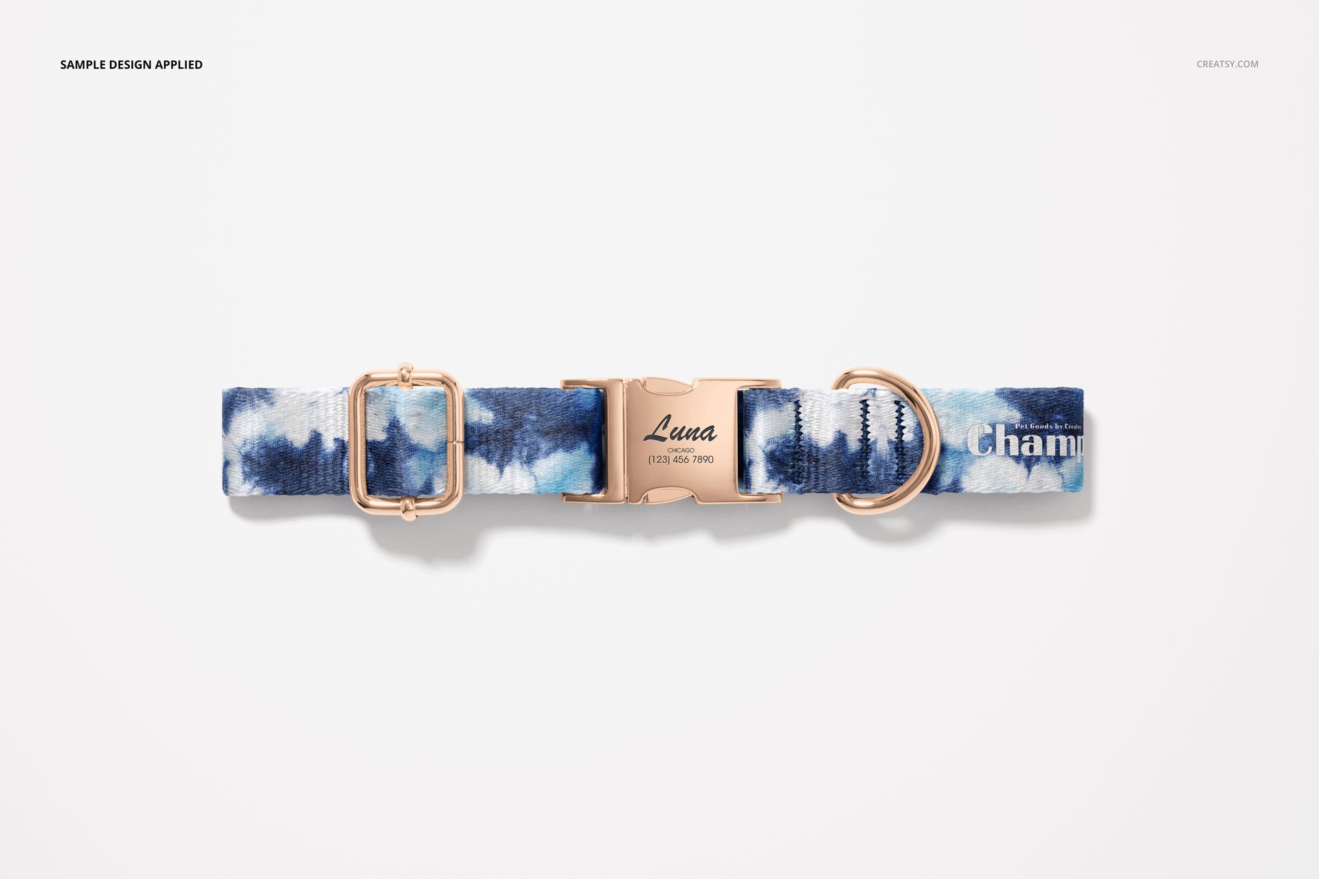 Blue and white patterned dog collar mockup with gold buckle and ring, displayed flat against a plain white surface.