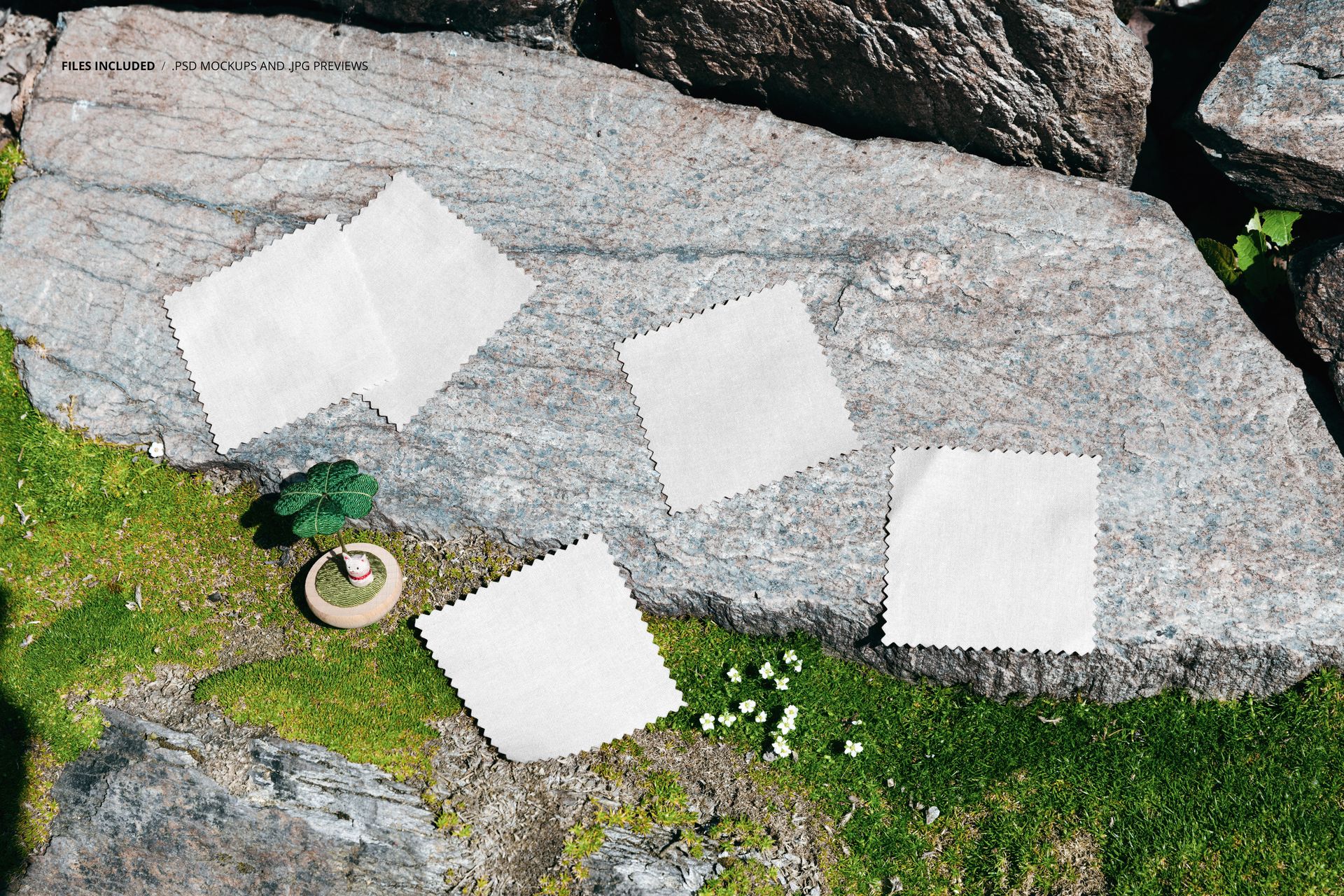 Fabric swatches mockup displayed on a large stone slab outdoors, with natural greenery and sunlight highlighting the textures.