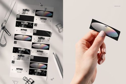 PSD mockup of rectangular stickers in monochrome and rainbow colors, presented on a flat surface and in a hand.