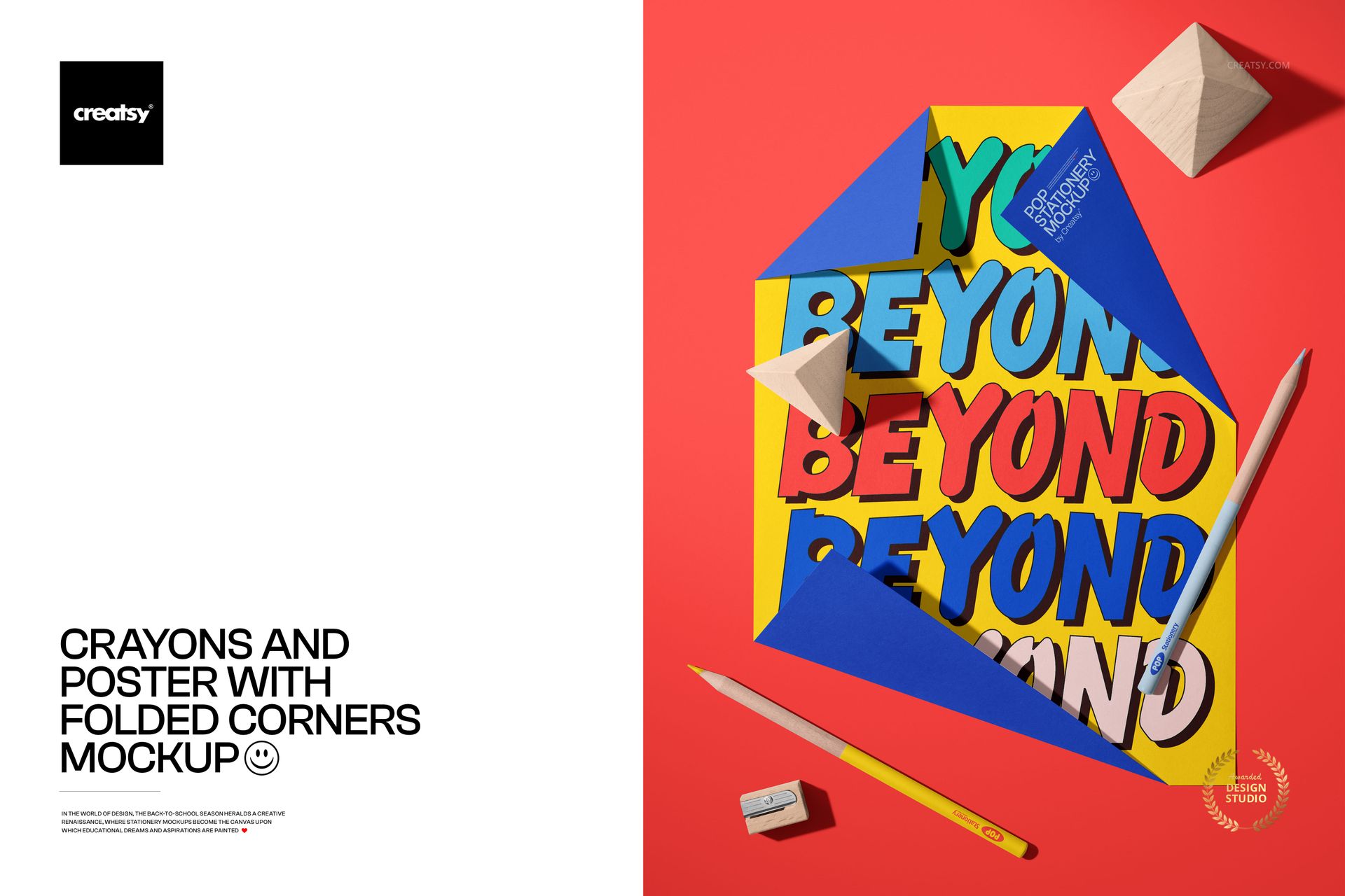 Stationery mockup featuring a colorful poster with folded corners, crayons, pencil, and geometric wooden props on a red surface.