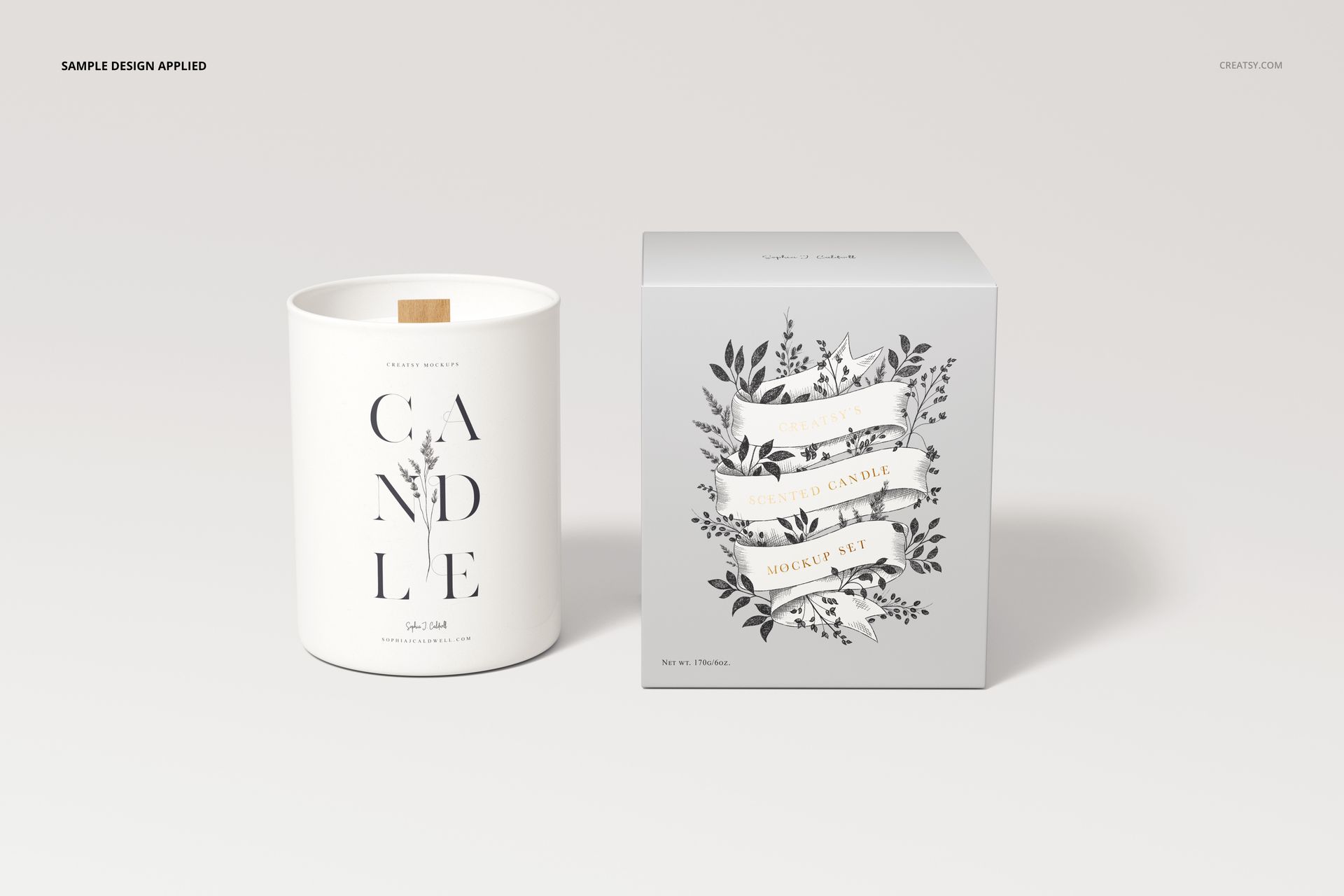 Wooden wick candle mockup showing a cylindrical white candle and matching box with black and white leaf illustrations.