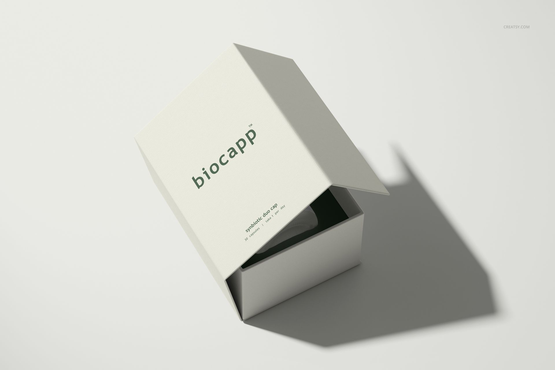 Minimalist cosmetics packaging mockup featuring a white box with open lid and visible bottle, soft shadow effect.