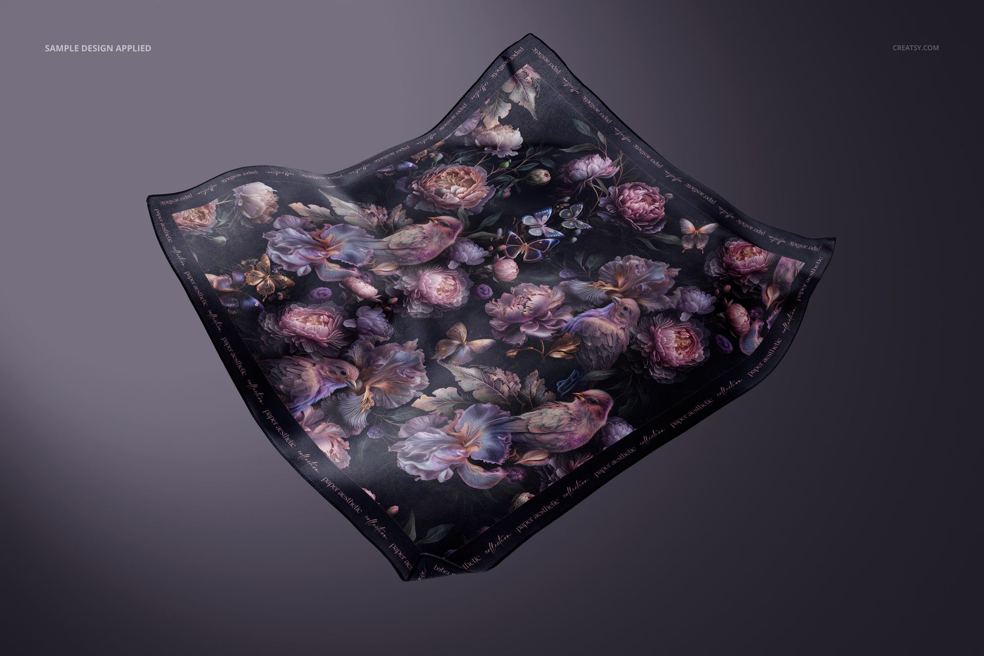 Silk scarf mockup featuring a square shape and intricate floral design, displayed floating against a gray backdrop.
